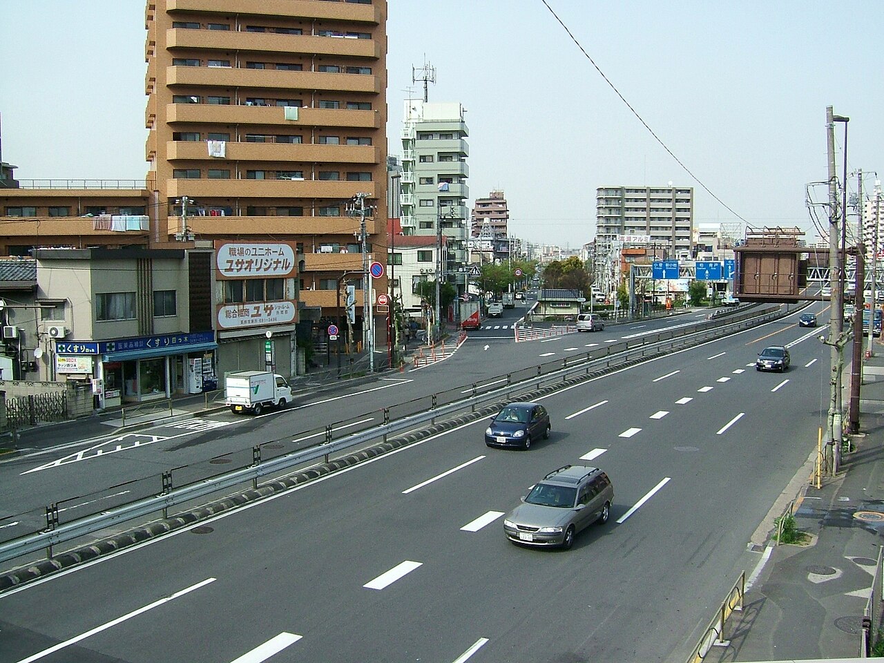Left-hand traffic in Japan — combine with vegetation and script for country ID